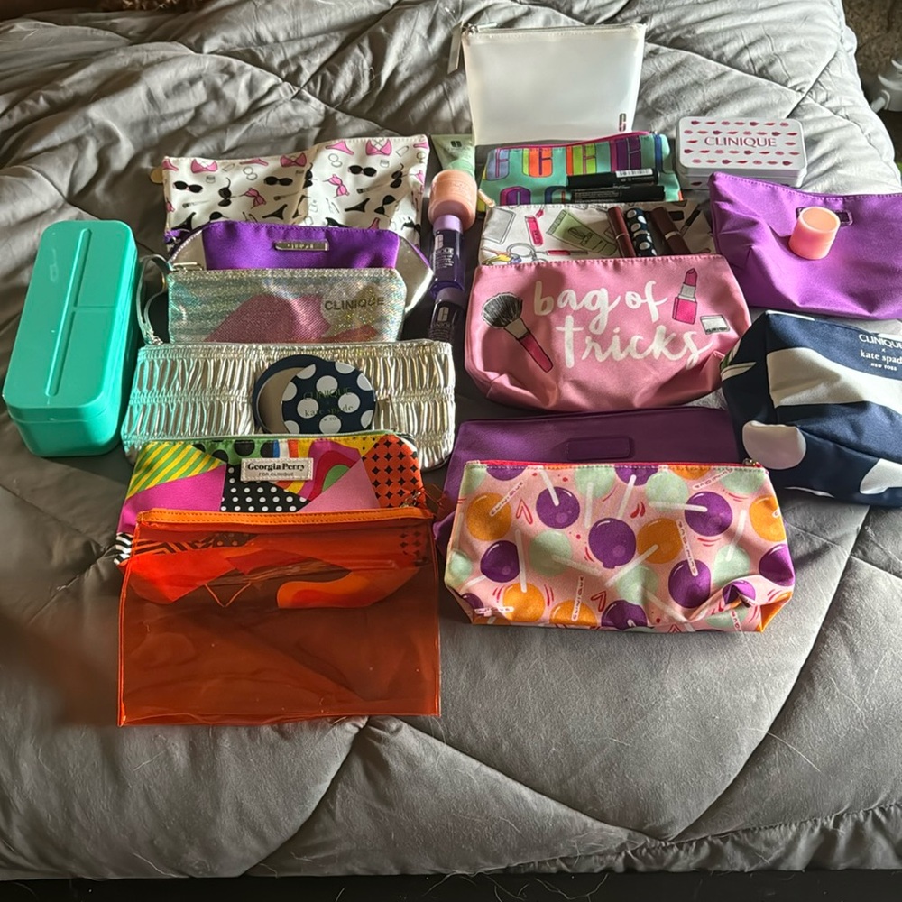 Clinique makeup bags and travel items..